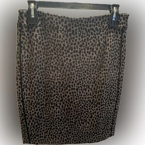 Ann Taylor animal print skirt with black side piping.
